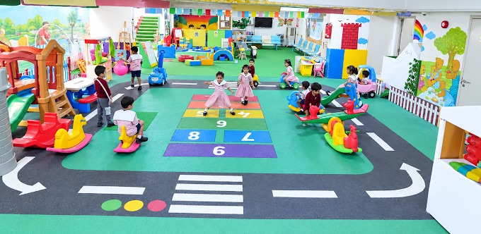 Children smiling and learning at Noah’s Ark Nursery