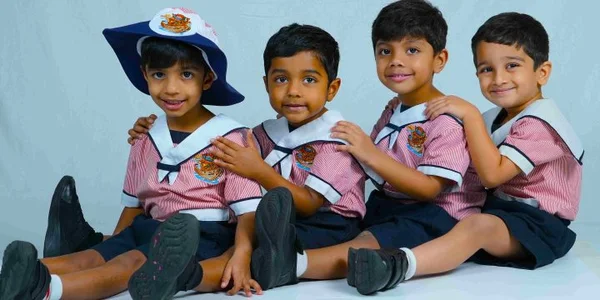 Four children learning together at Noah’s Ark Nursery